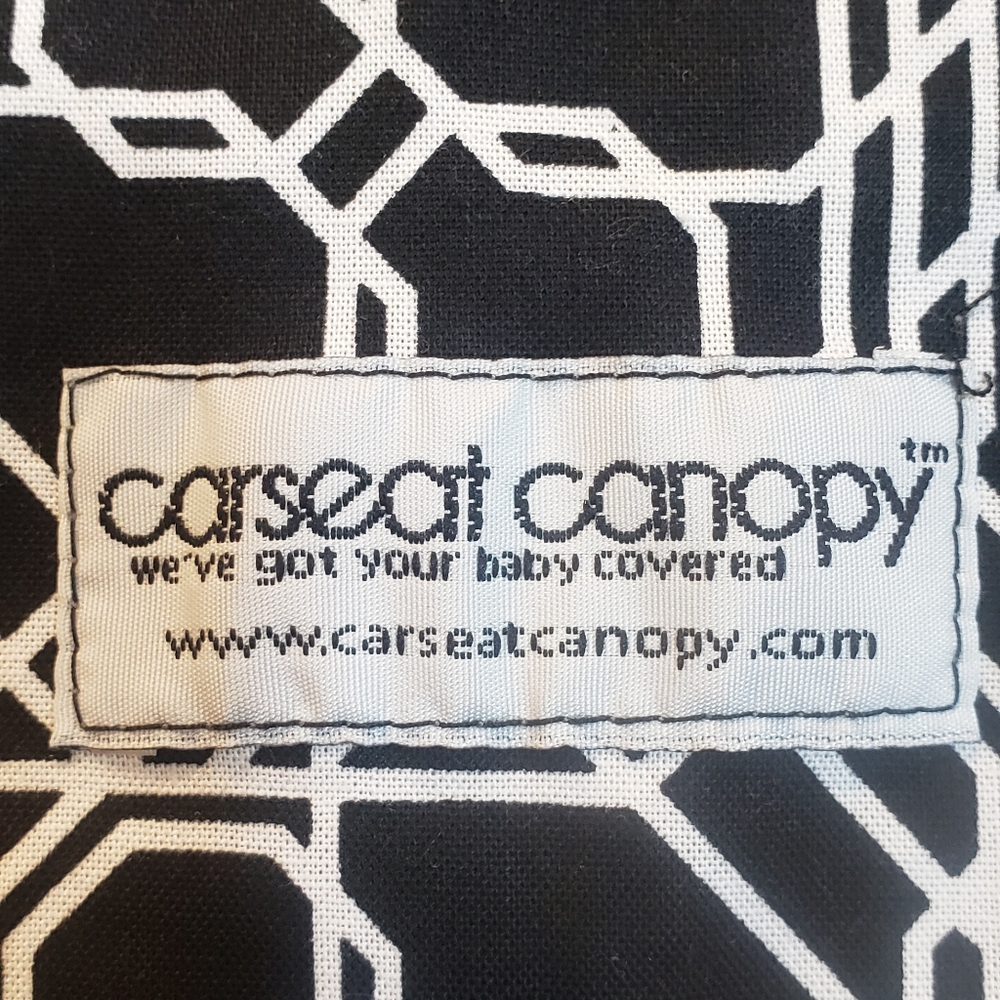 Carseat cover. New without tags.